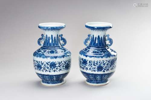 A LARGE PAIR OF BLUE AND WHITE PORCELAIN BALUSTER VASES