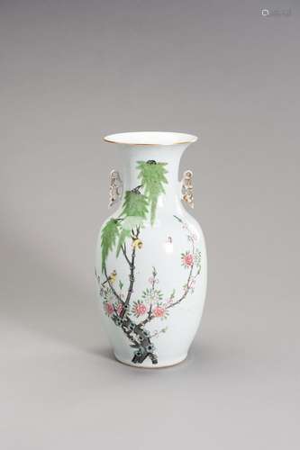 A PORCELAIN BALUSTER VASE