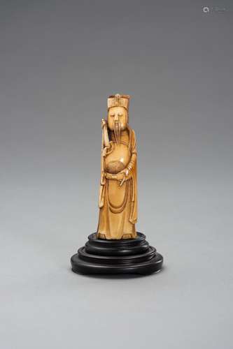 AN IVORY CARVING OF AN IMMORTAL, MING