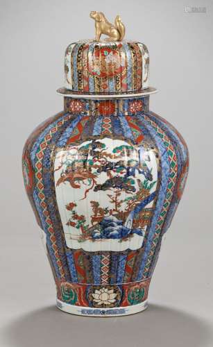 A RARE ENSEMBLE OF A LARGE IMARI VASE AND COVER ON AN ANCIEN...