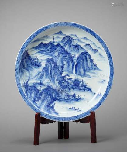 A MONUMENTAL ARITA PORCELAIN CHARGER WITH A MOUNTAIN LANDSCA...