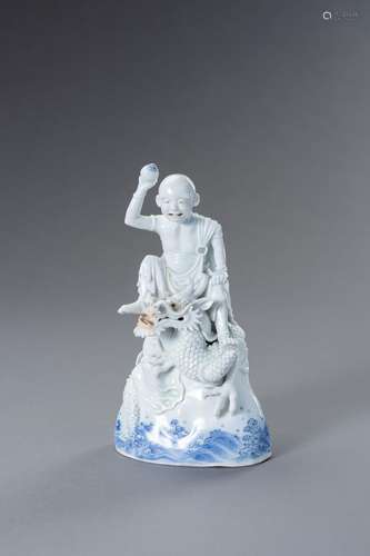 A HIRADO PORCELAIN FIGURE OF RAKAN HANDAKA SONJA WITH DRAGON