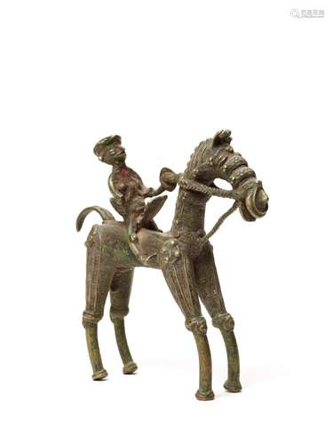 A BASTAR BRONZE WARRIOR WITH A SHIELD ON HORSEBACK