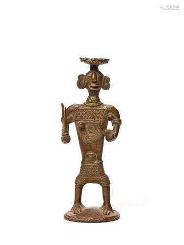 A BASTAR BRONZE OF A FEMALE DEITY WITH TRIDENT AND KHAPPAR