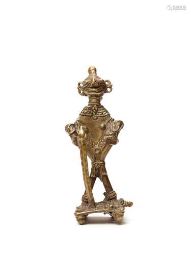 A BASTAR BRONZE OF A FEMALE DEITY WITH A CEREMONIAL STAFF AN...