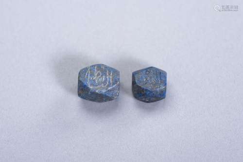 TWO LAPIS LAZULI INTAGLIO BEADS WITH ISLAMIC CHARACTERS