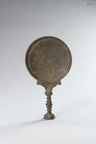 A GANDHARAN BRONZE MIRROR WITH A FIGURAL SCENE