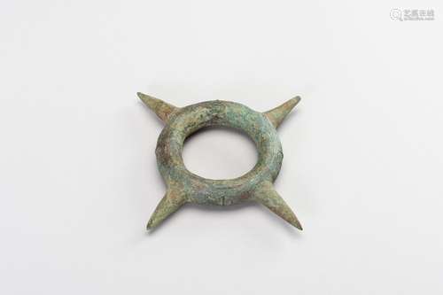 A BRONZE BANGLE WITH SPIKES