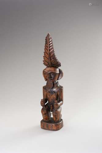 A WOOD FIGURE OF A MALE ANCESTOR (ADU ZATUA)