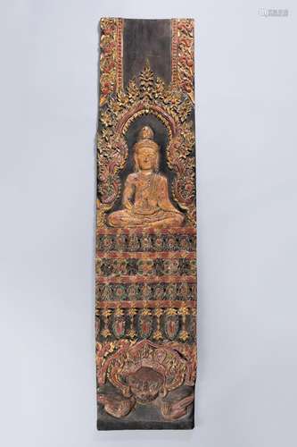 A LARGE CARVED WOOD PANEL DEPICTING BUDDHA