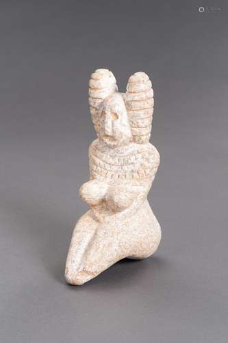 A STONE INDUS VALLEY STYLE FIGURE OF A FERTILITY GODDESS