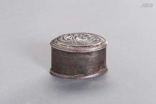 AN OVAL-SHAPED SILVER MEDICINE BOX