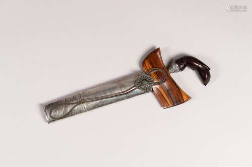 A FINE INDONESIAN KRIS WITH SILVER SHEATH