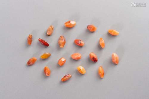 AN AMAZING LOT OF NINETEEN ANTIQUE CARNELIAN BEADS