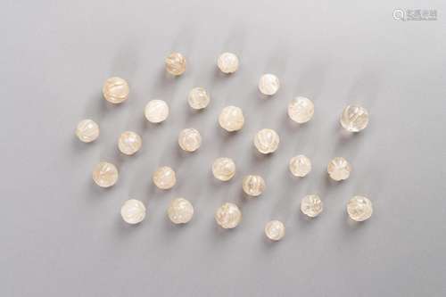 AN AMAZING LOT OF TWENTY-FIVE ANTIQUE ROCKCRYSTAL BEADS