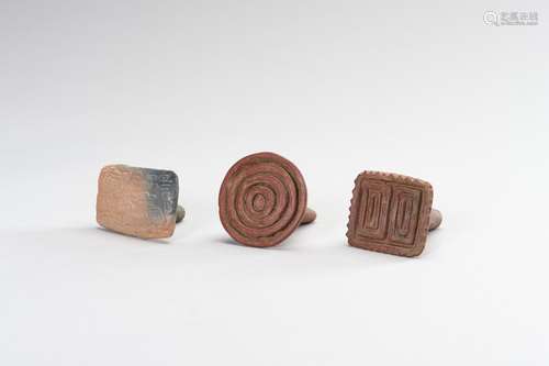 A GROUP OF THREE CERAMIC SEALS