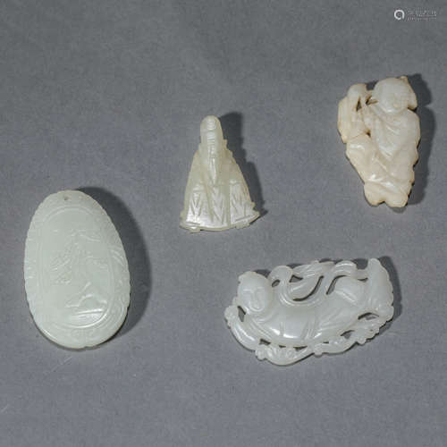 Four Carved Jade Ornaments