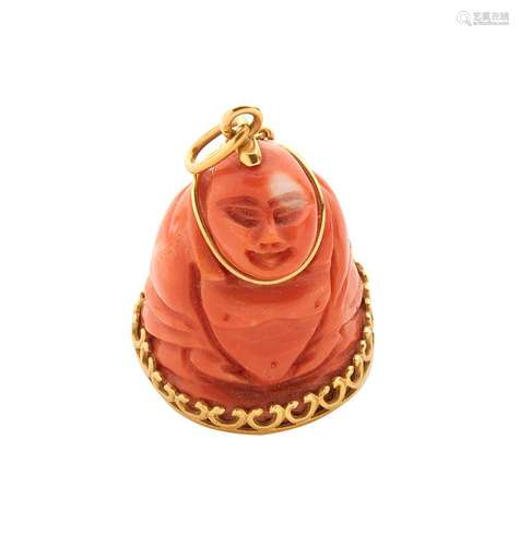 Pendentif en or jaune18K (750/°°) figurant un bouddha en cor...