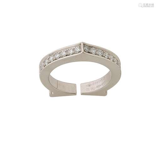 CARTIER, Bague en or gris 18k (750/°°), anneau formant le si...