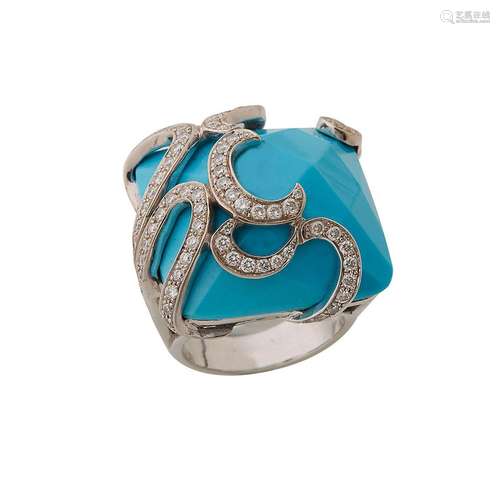 Bague de createur en or gris 18K (750/°°), ornée d une turqu...