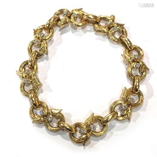 Bracelet en or jaune 18K (750/°°), à maillons stylisés, ponc...