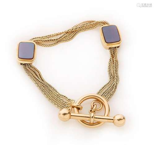 Bracelet en or jaune 18k (750/°°), composé de quatre chaine ...