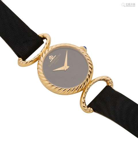 BAUME & MERCIER, Montre bracelet de dame en or jaune tor...