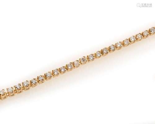 Bracelet ligne en or jaune 18k (750/°°), orné de diamants ta...