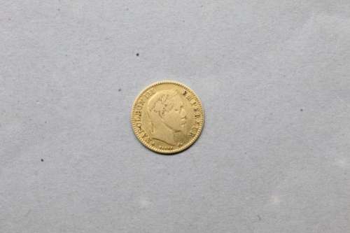Pièce en or de 10 francs Napoléon III tête lauréee (1863 A)
...