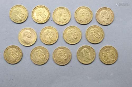 Lot de quatorze pièces en or comprenant :
- 20 Mark Freie un...