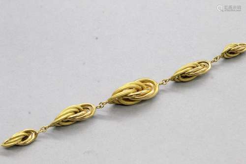 Collier en or jaune 18K (750) à motif dit de "noeud de ...