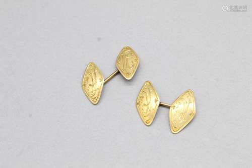 Paire de boutons de manchettes en or jaune 18k (750) en form...