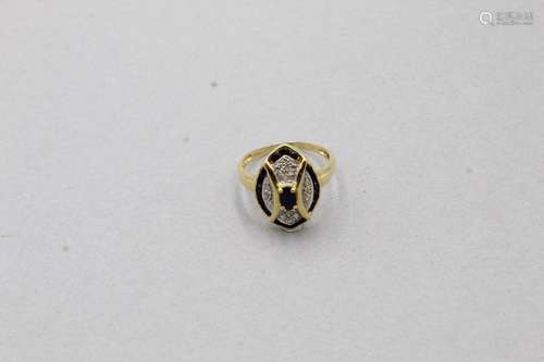 Bague navette en or jaune et gris 18k (750) ornée d'un s...