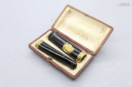 Paire de fume cigarettes en ambre, embouts et cartouches de ...