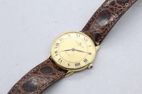 BAUME & MERCIER 
Montre bracelet d'homme en or jaune...