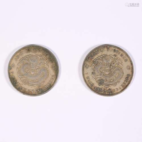 Two silver coins with dragon pattern in Anhui during the Gua...