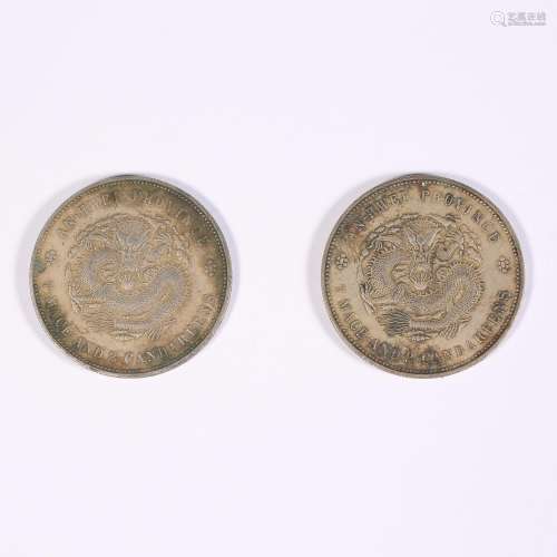 Two silver coins with dragon pattern in Anhui during the Gua...