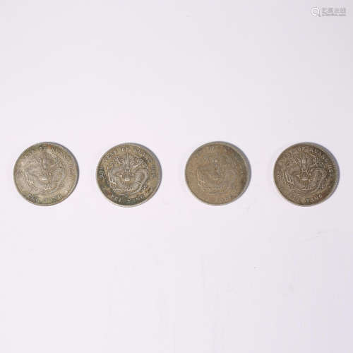 Four silver coins with dragon pattern in Guangxu period