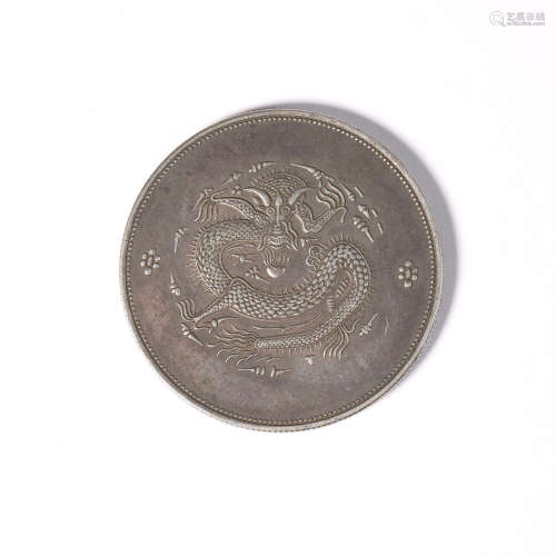 Silver coin with dragon pattern in Guangxu period