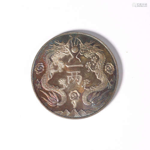 Silver coin with double dragon pattern during Guangxu period