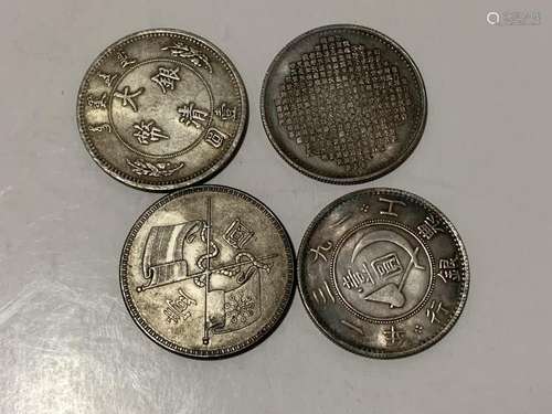 Four Chinese Coins