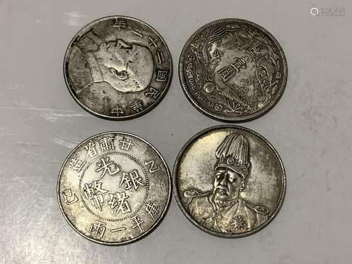 Four Chinese Coins