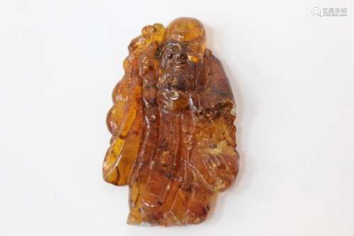 Chinese Amber Carved Shou figurine