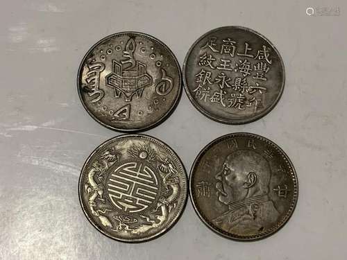 Four Chinese Coins