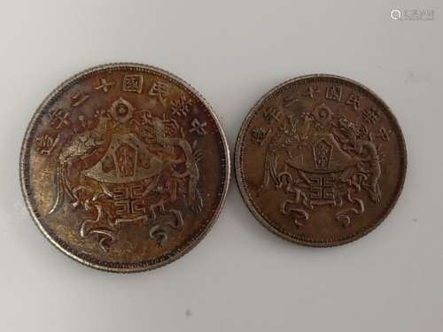 TWO CHINESE OLD SILVER COINS