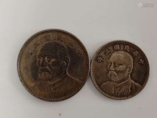 TWO CHINESE OLD SILVER COINS