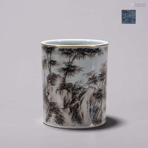An ink colored bamboo and stone porcelain brush pot