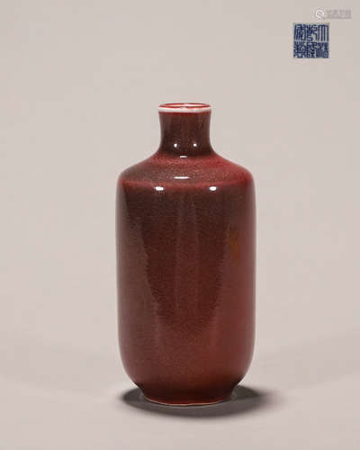 A red porcelain snuff bottle