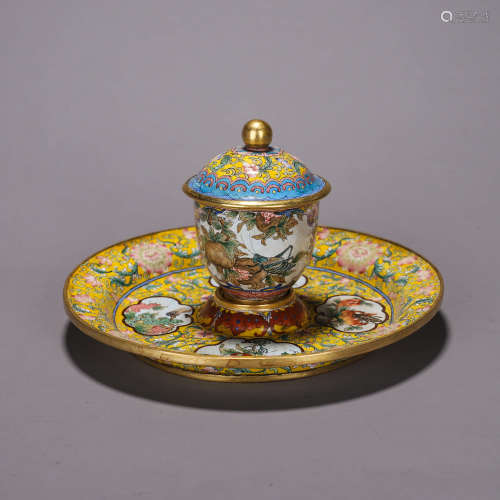 A copper enamel covered bowl