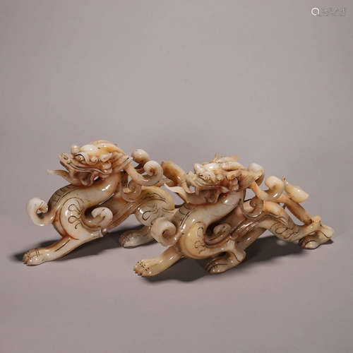 A pair of Hetian jade walking dragons